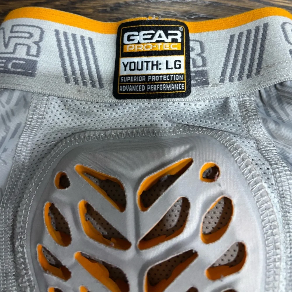 Gear Pro-Tec Youth LG Boys Padded Football Shorts Gray Orange Lightweight‎